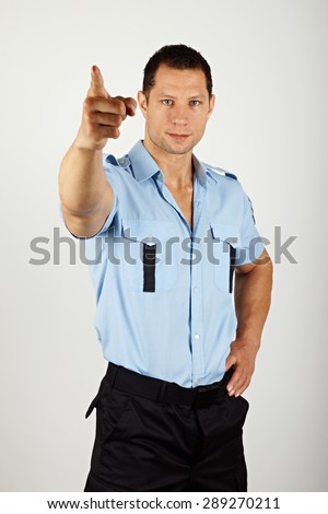 Policeman showing on you with gray background
