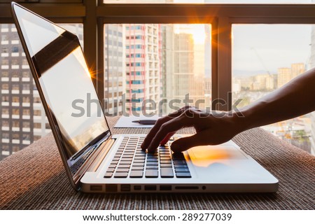 Business person using laptop computer Royalty-Free Stock Photo #289277039