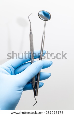 dentist's instruments with shallow depth of field blue tinted