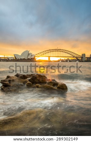 Sunset at Opera house and Harbour bridge in Sydney, New South Wales state of Australia. Royalty-Free Stock Photo #289302149