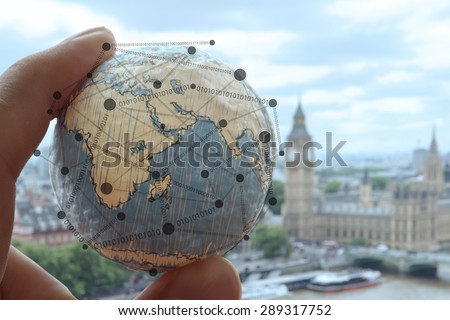 close up of businessman hand showing texture the world as concept Elements of this image furnished by NASA london city background
