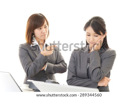 Disappointed Asian business women
