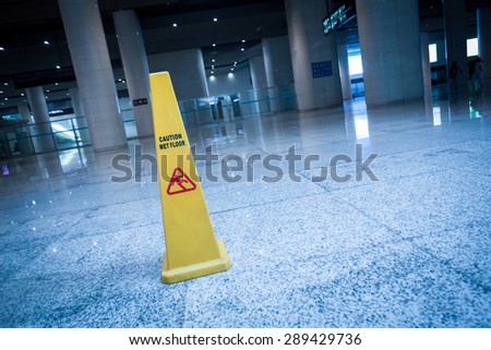 slippery sign on floor of modern building