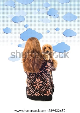 Girl hugging her dog over clouds background  