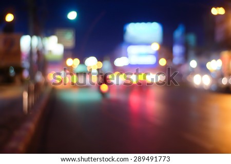 Blurred street light during night and evening traffic.