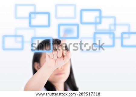 Girl pushing high technology button with computer screen