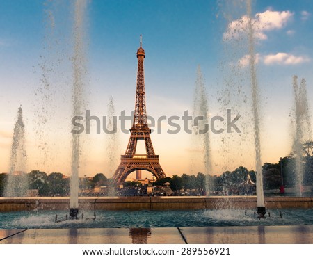 Eiffel Tower (La Tour Eiffel) with fountains. Beautiful sunset landscape in Paris