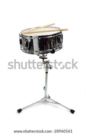A snare drum on stand on a white background with drumsticks.  Percussion Instrument