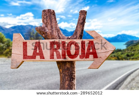 Rioja wooden sign with road background