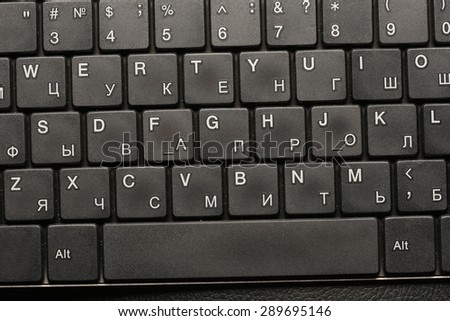 macro black keyboard on dark background studio