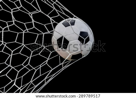 Shoot soccer ball in goal, net on black isolated background. Royalty-Free Stock Photo #289789517