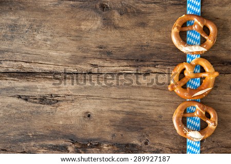 Bavarian pretzels on old wooden background for Oktoberfest