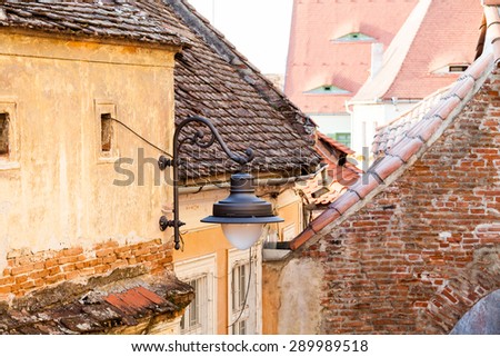 Roofs and architectural details in Sibiu, Romania. Special roof desigh with eyes