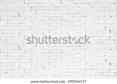 Old aged rough brick wall texture background painted in white color in grunge style 

