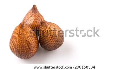Salak fruit or snake fruits over white background