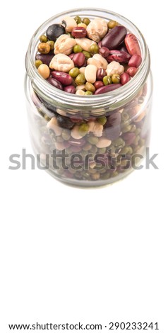 Mix bean of black eye peas, mung bean, adzuki beans, soy beans, black beans and red kidney beans in a mason jar over white background
