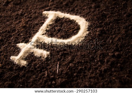 Ruble symbol written on brown ground 