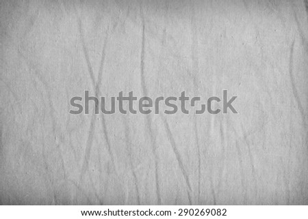 Gray fabric texture with delicate striped pattern, vignette. Cotton canvas background.