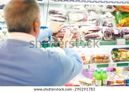 Man shopping at the supermarket