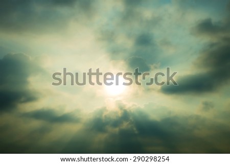 Sky with cumulus clouds and a bright sun