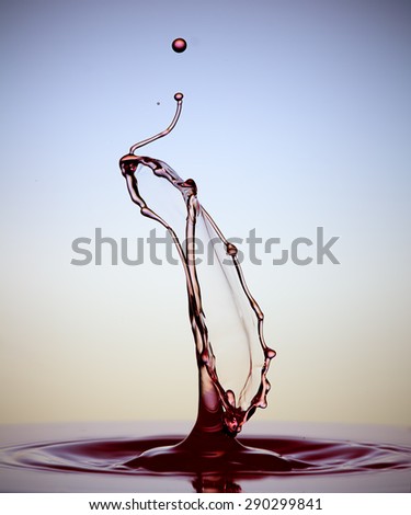Colorful splashing. Water drop close-up. Royalty-Free Stock Photo #290299841
