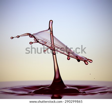 Colorful splashing. Water drop close-up. Royalty-Free Stock Photo #290299865
