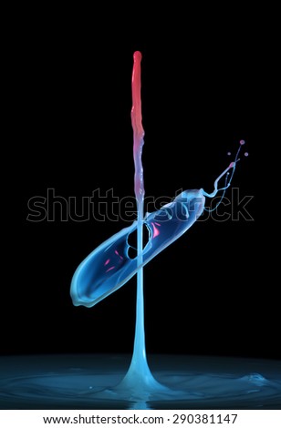Colorful splashing on black background. Water drop close-up. Royalty-Free Stock Photo #290381147