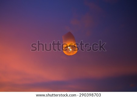 Floating lanterns in the evening sky at Thailand