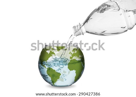 Water spilled from bottle made the wave in globe bowl. Environmental protection concept, global warming.
