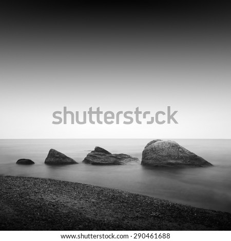 Black coast. Beautiful daytime long exposure photo of beach taken in black and white. Black sea, Odessa, Ukraine