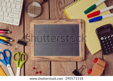 Back to school background with chalkboard. View from above