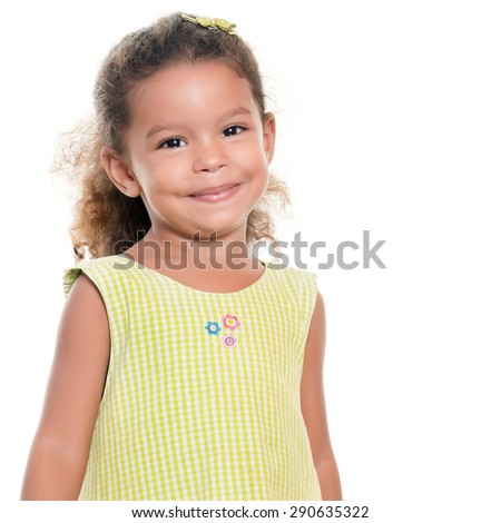 Portrait of a cute small hispanic girl isolated on white