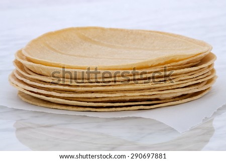 Mexican corn tortillas on retro vintage carrara marble, perfect for all your Mexican and tex-mex recipes.