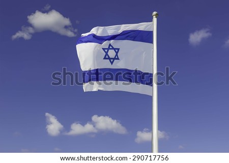 An Israel flag flapping in the wind against the blue sky background with  white clouds.
The flag is in white and blue colors with the star of David.
The flag is posted on a pole high in the sky.