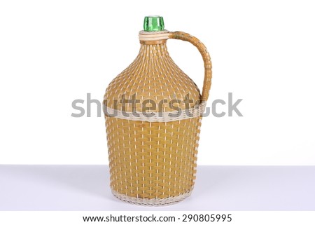 big green glass wine bottle on a white background