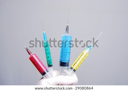 picture of a different colors syringes