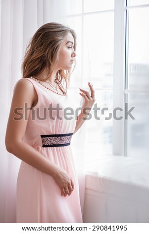 Beautiful Girl Near Window
