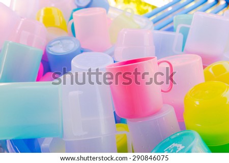 A ton of plastic glass of various color 