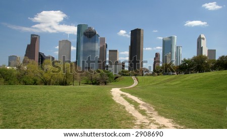 Road leading to city skyline with skyscrapers - Symbolic of road to success in the big city