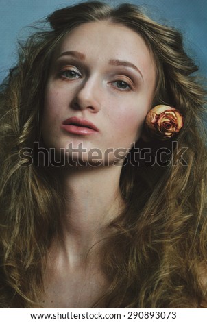 portrait photo of beautiful model face with curly hair 