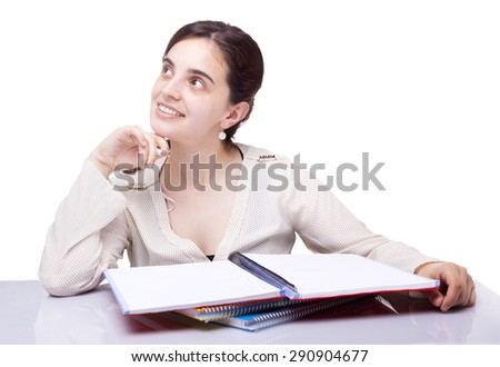Pensive female student looking up, isolated on white background