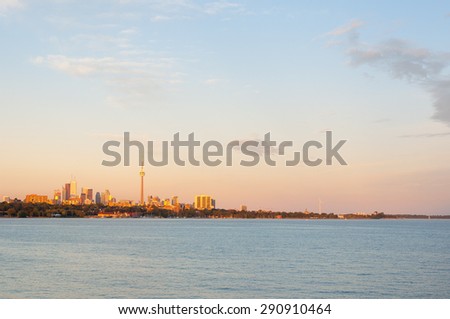 Beautiful and colorful sunset over ontario lake in toronto, Canada, with skyline