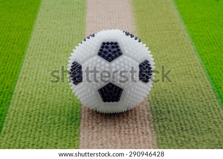 rubber soccer ball on carpet