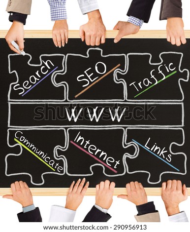 Photo of business hands holding blackboard and writing WWW schema