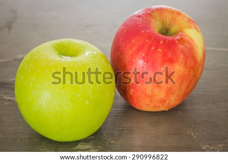 Green and red apple on the table, stock photo