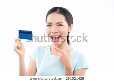 bright picture of smiling asian woman showing credit card