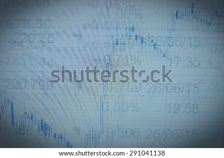 Financial data on a monitor. Multiple exposure.