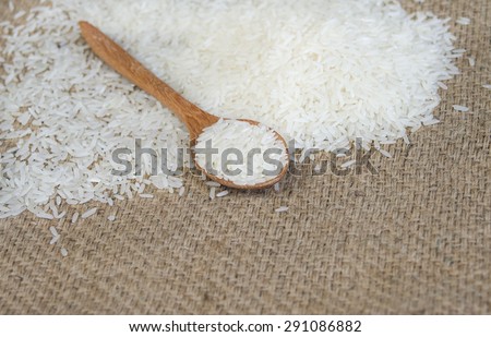 Rice on sackcloth background