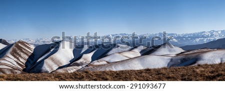 The Caucasus mountain range, photo taken from the top of the Gimrinskogo mountain range. Dagestan 2015. The highest point, the peak. in the background is seen the main Caucasian ridge. Panorama