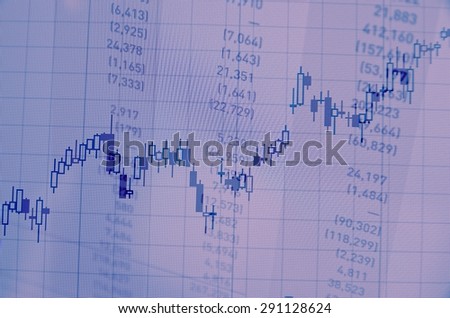 Close-up of financial data on PC screen. Multiple exposure.